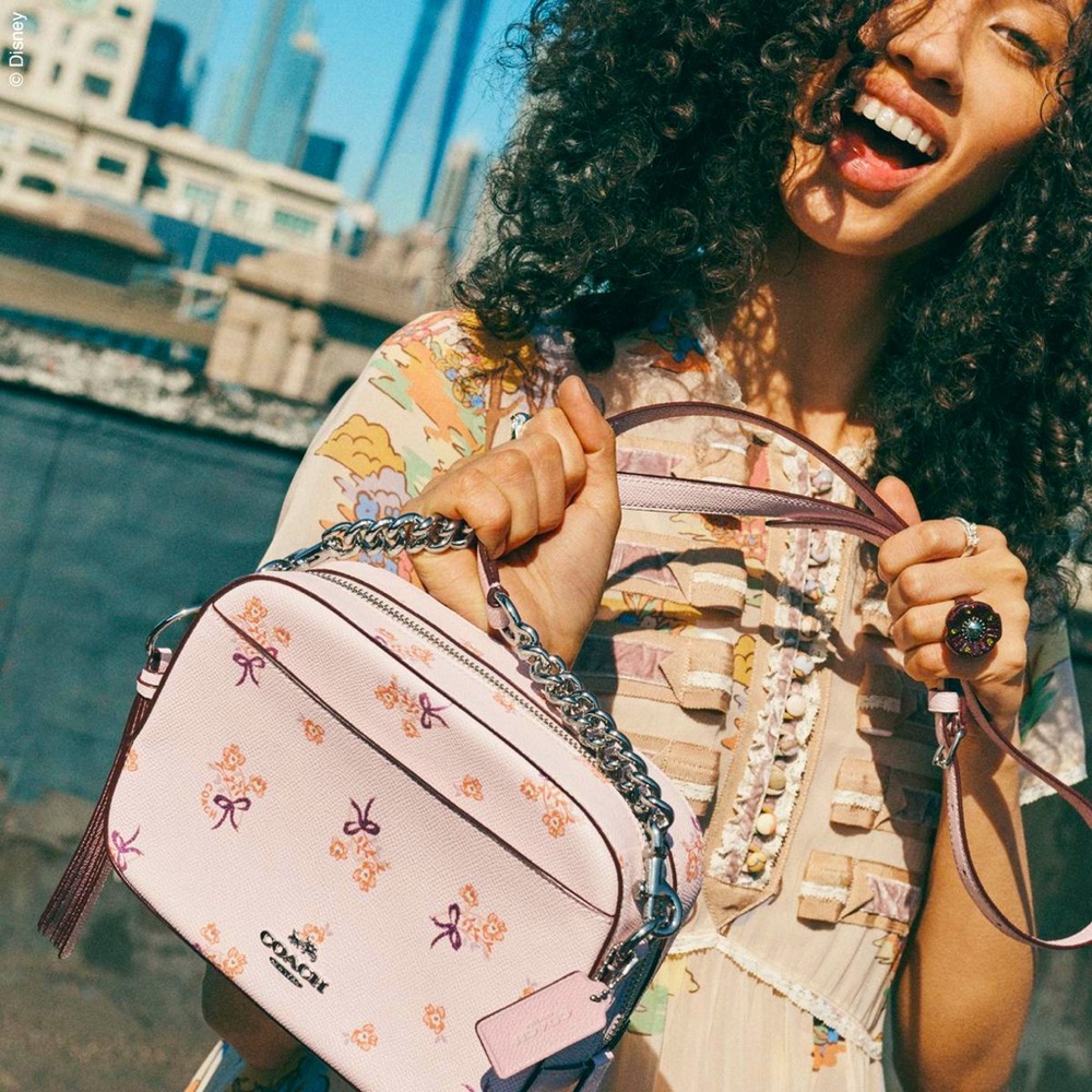 The camera crossbody Coach bag